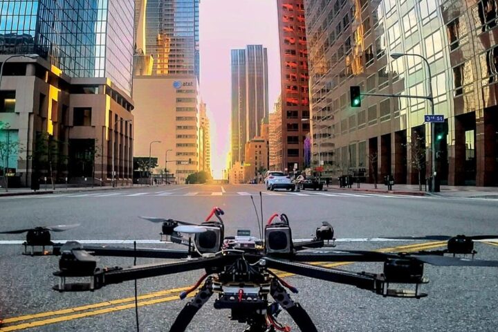 An aerial filming drone landed in a San Diego street