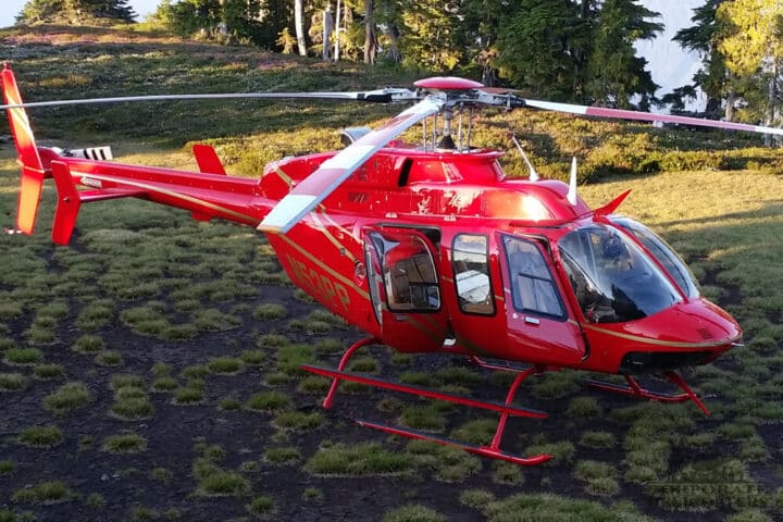 2007 Bell 407 helicopter landed in a field