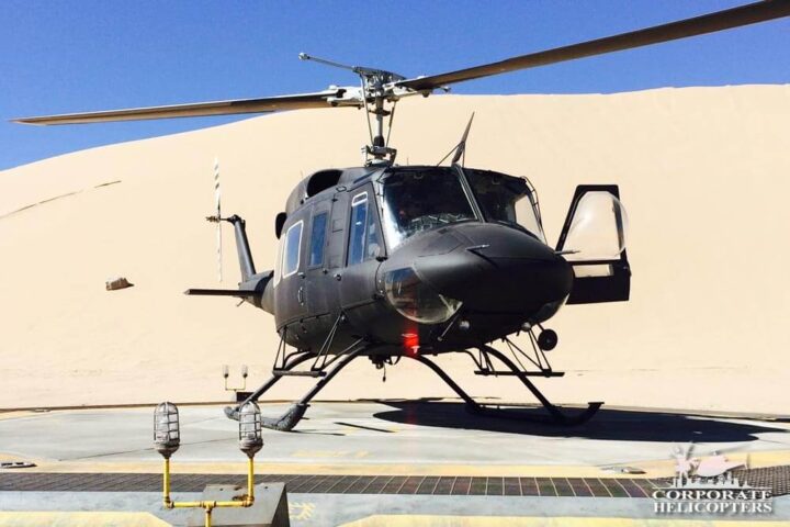 Helicopter sits on a helipad in the desert on the set of Maze Runner: The Scorch Trails
