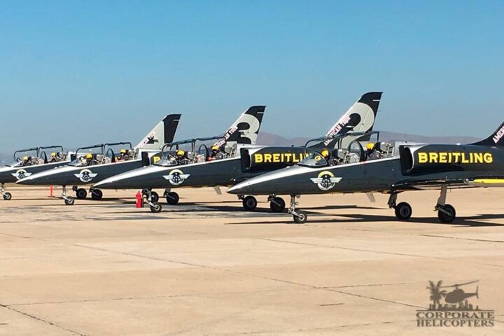 5 Breitling jets on an airfield