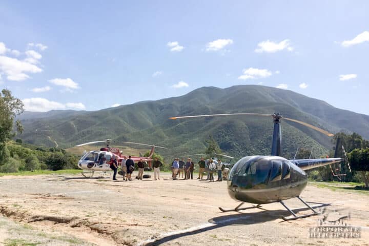 2 helicopters landed in a field in Mexico