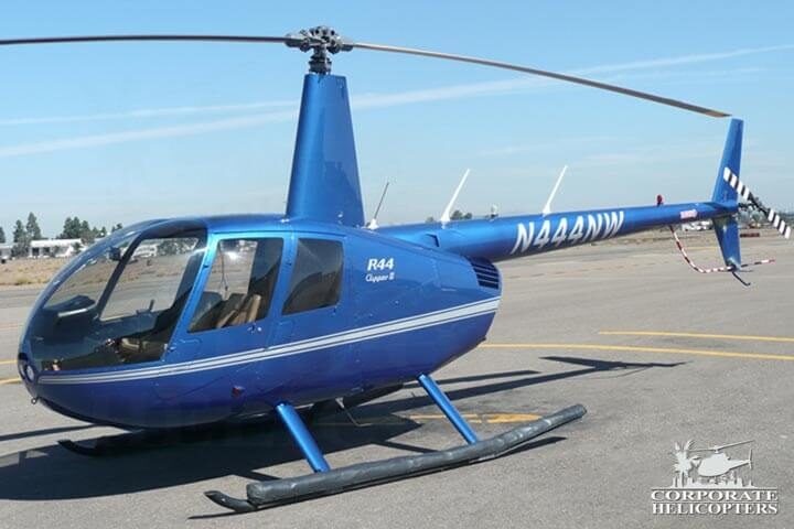 2009 Robinson R44 Clipper II helicopter on an airfield