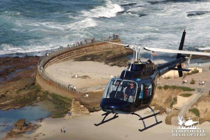 Helicopter flies over La Jolla point