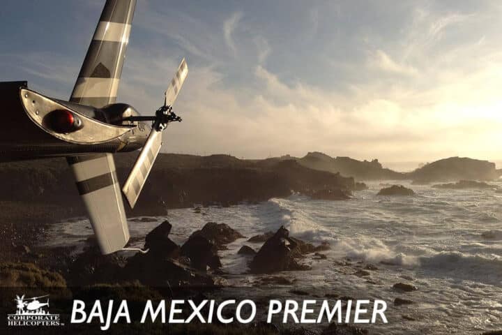 Helicopter tail in front of Mexican coastline. Text reads: Baja Mexico Premier